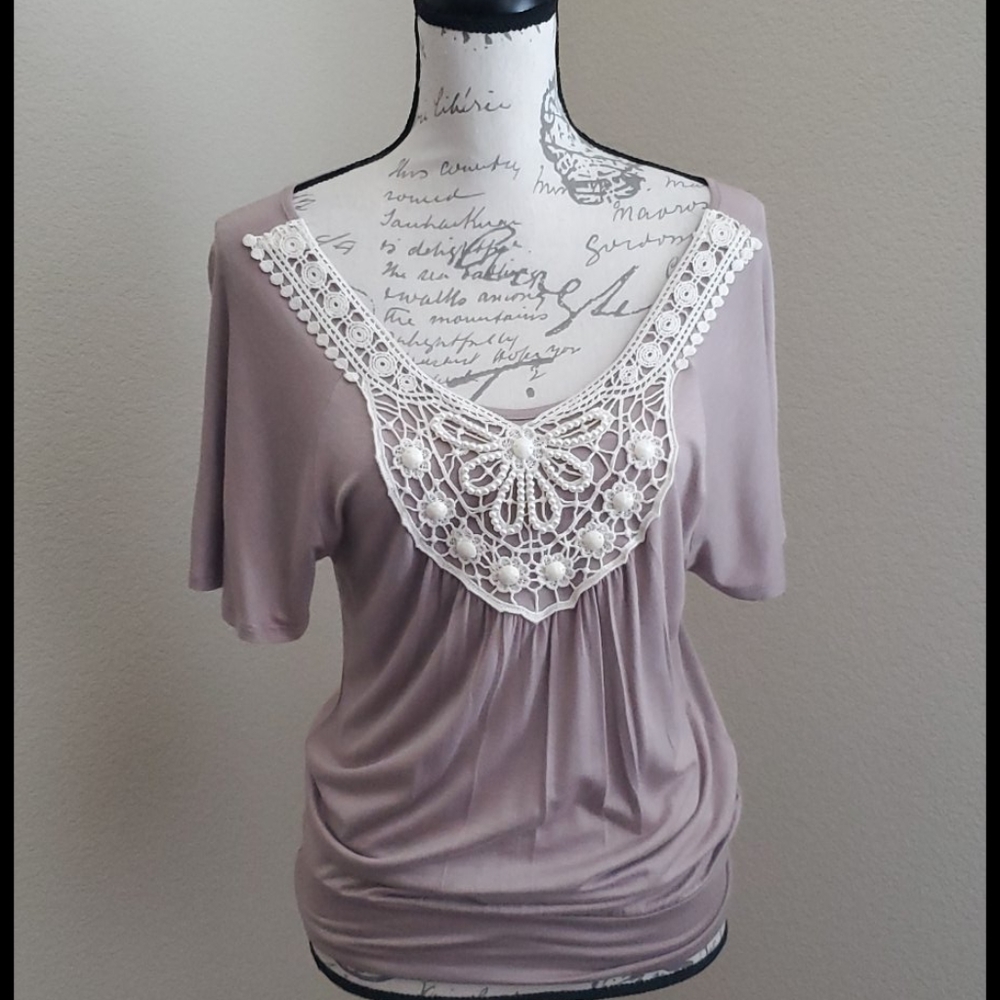 Tan bead and lace embellished top. Small